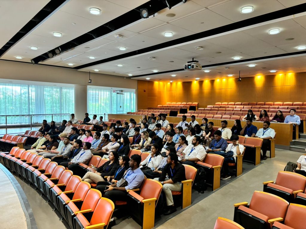 Students in Homewood campus auditorium.