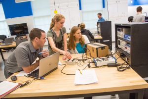 Students collaborating on project in Engineering for Professionals course.